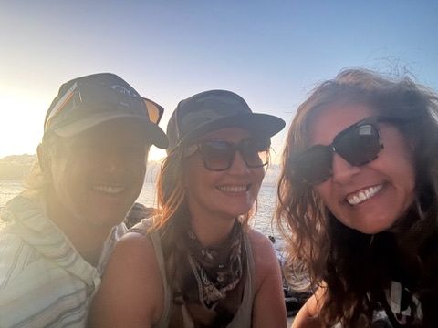 Kris Bradley with friends at golden hour on Maui.
